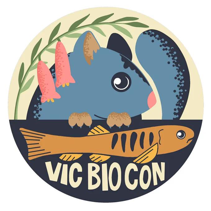 The new VicBioCon logo. It is a circular graphic, the top half is a pale yellow background and the bottom half is a deep blue background. On the top left of the circle, a stylised common heath plant with green leaves and pink flowers frames the edge. Beneath it, overlaid on the yellow background, is a stylised greyish-blue leadbeater's possum. Beneath the possum is a golden-brown stylised barred galaxias overlaid on the deep blue background. At the bottom of the circle is the text "VicBioCon" in pale yellow. 