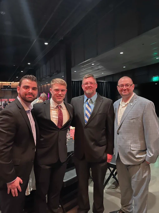 Matt McMaster, Kaden Wetjen, Scott Strohmeier, and Josh Odson pose in suits at the Jet Award Gala