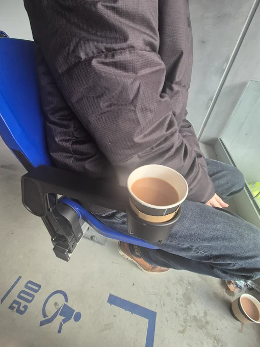A cup of tea in the newly installed drinks holder