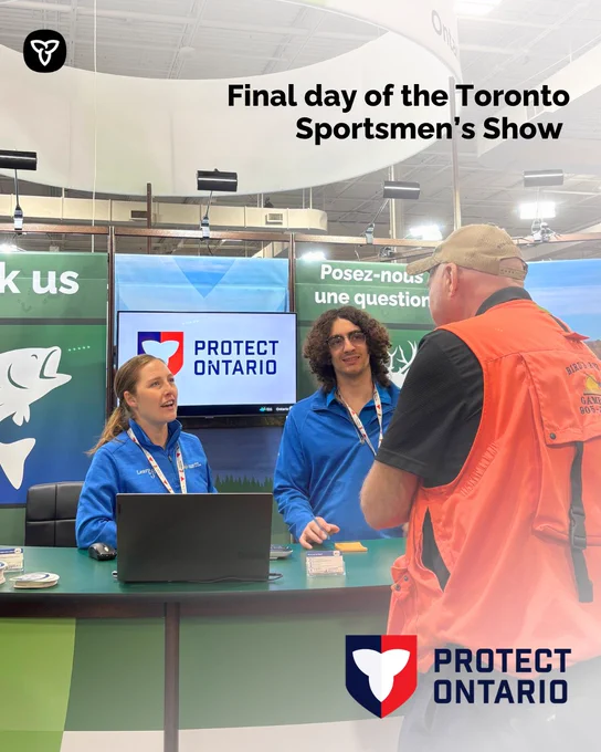 staff members talking to a member of the public, Text reads “Final day of the Toronto Sportsmen's Show” 