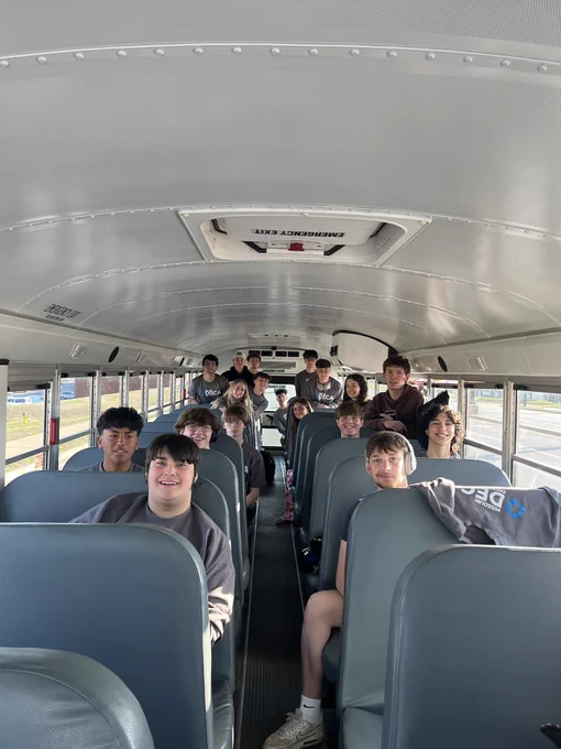 SCHS DECA students on a school bus heading to Kansas City Missouri for the state competition.