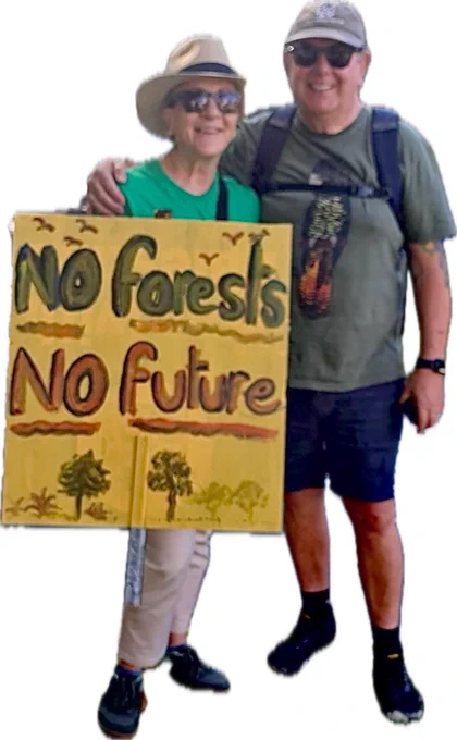 2 people holding sign saying “no forests no future” for the March for forests March