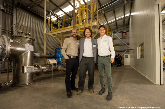 PyroGenesis’ engineering team José Urbina, Jean-René Gagnon, and Aidan Moir, stand in front of PyroGenesis’ all-electric plasma-based SPARC™ system, at the opening of New Zealand’s National Refrigerant Destruction Facility.