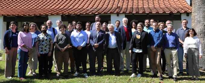 Hybrid study participants pose for a group photo in front of the Tolman Bacher House