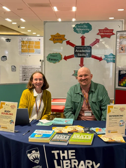 Image of our our academic skills team at  a previous academic support pop up