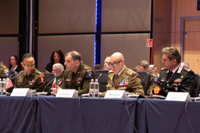 photo of Lt. Gen. Carmine Masiello and Gen. Christopher Donahue seated at a table