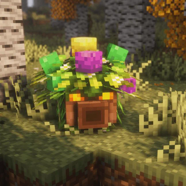 A small wooden creature with shrubbery and flowers for hair.