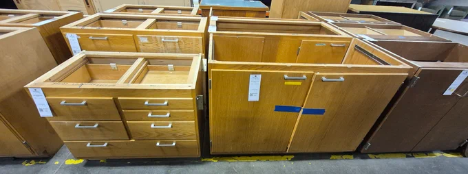 Various wood base cabinets at Surplus.