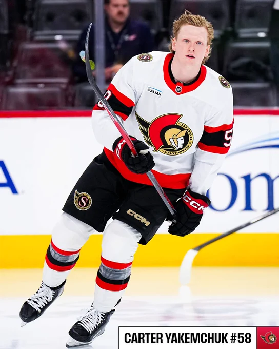Carter Yakemchuk on ice in a Senators uniform for warmups. 