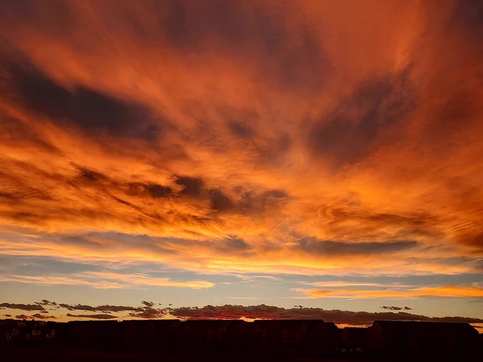 Sunset of pastel blues and oranges over the Rockies in Colorado