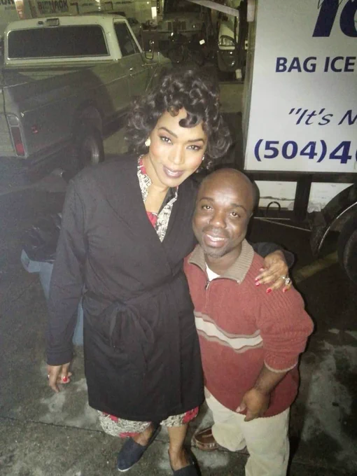 Angela dressed as Desiree with a fan