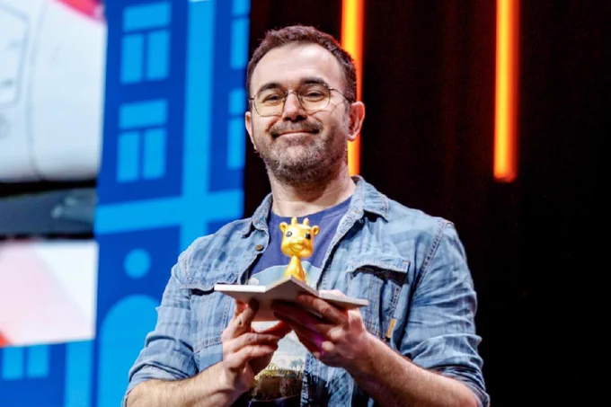 SCNF holding up the Golden Phippy award for being the 2026 Top End User at KubeCon   CloudNativeCon
