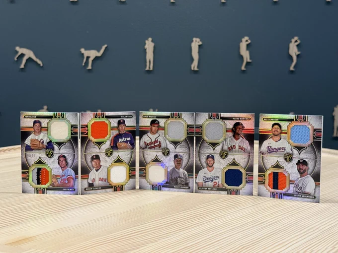 2024 Topps Triple Threads Deca Relic Combo Book Card (10/10)
Tom Seaver, New York Mets
Jim Palmer, Baltimore Orioles
Nolan Ryan, Houston Astros
Roger Clemens, Boston Red Sox
Greg Maddux, Atlanta Braves
Randy Johnson, Seattle Mariners
Pedro Martinez, Boston Red Sox
Clayton Kershaw, Los Angeles Dodgers
Max Scherzer, Texas Rangers
Justin Verlander, Houston Astros