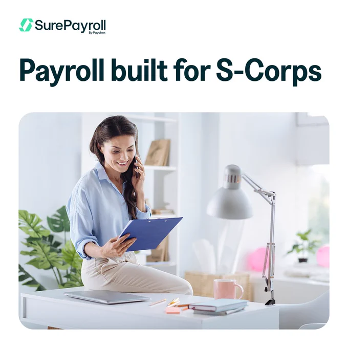 A a business owner sitting on a desk, smiling while holding a clipboard. They are talking on a phone. A laptop and a desk lamp are nearby. The SurePayroll logo and the text "Payroll built for S-Corps" are at the top.