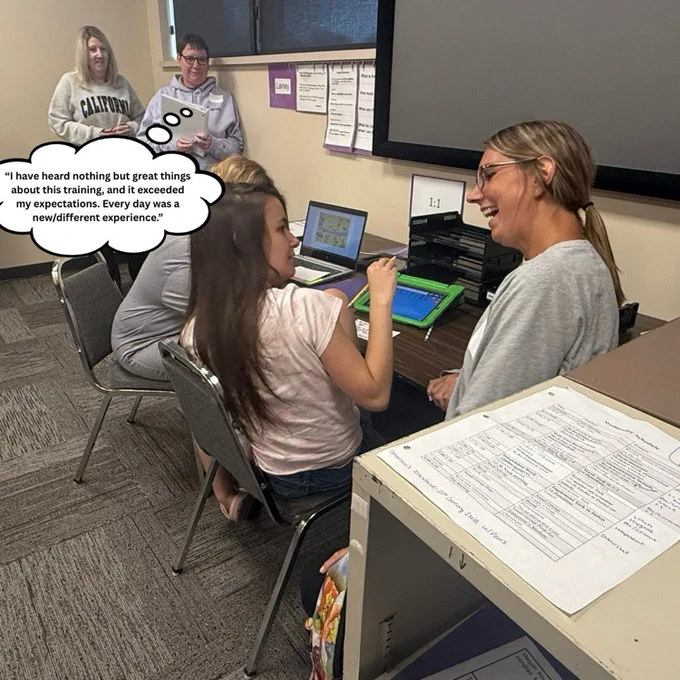 student working with teacher