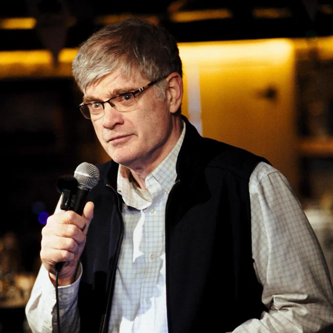 Martin Nutty speaks into a microphone.