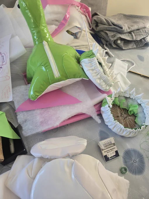 A table filled with fabric and a Nessie