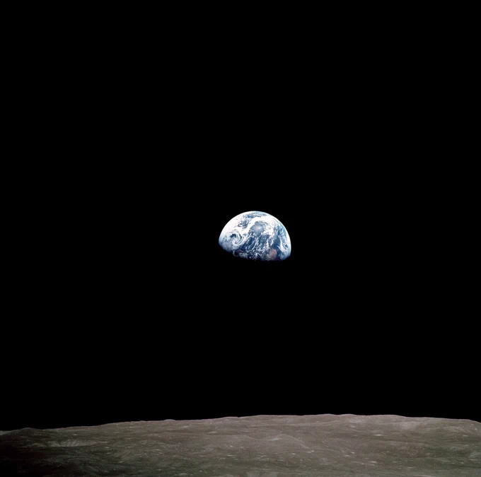 View of the Earth as seen by the Apollo 8 crew orbiting the Moon on December 24, 1968. File number AS8-14-2384. Credit: NASA/Bill Anders