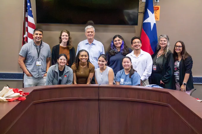 Group photo of UTMB School of Public and Population Health students with Dr. Philip Keiser and Galveston County Health District staff during a Public Health Practice II visit at GCHD.