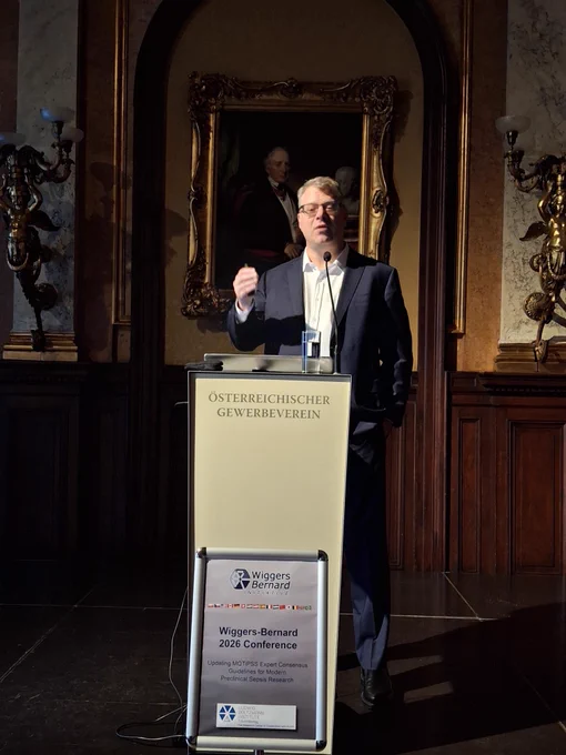 Philip Efron giving a talk at a podium.