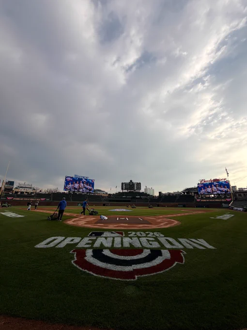 Pictured: a scenic view of Wrigley Field the morning of Opening Day. The 2026 Opening Day logo is in the foreground.