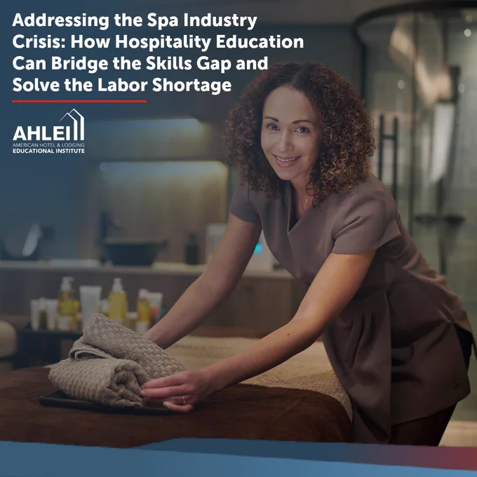 A person is setting towels on a spa bed in a dimly lit room, smiling at the camera. The image promotes AHLEI's message about addressing the spa industry crisis through hospitality education.