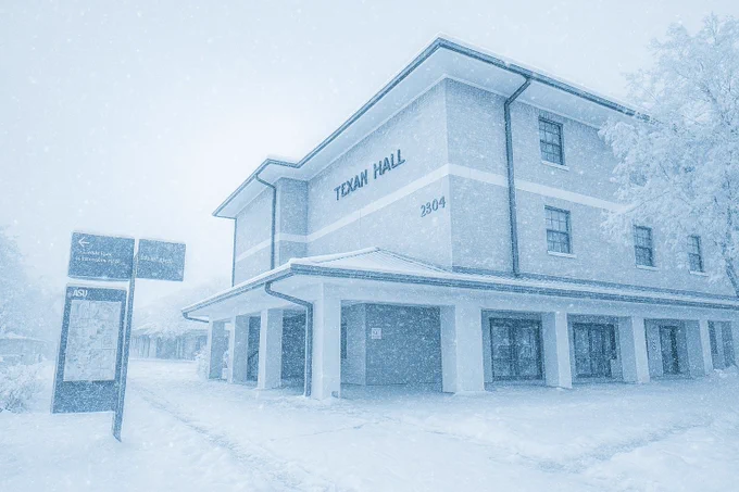 An image of a residence hall with a cold and frozen effect on the image.