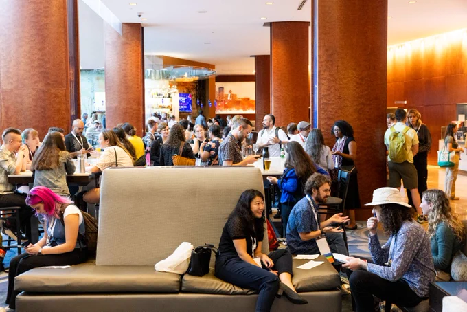 Early career ecologists network together during a mixer at the Baltimore Hyatt Regency