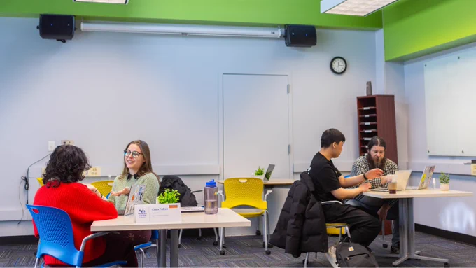 Students getting help from consultants in the Center for Excellence in Writing.