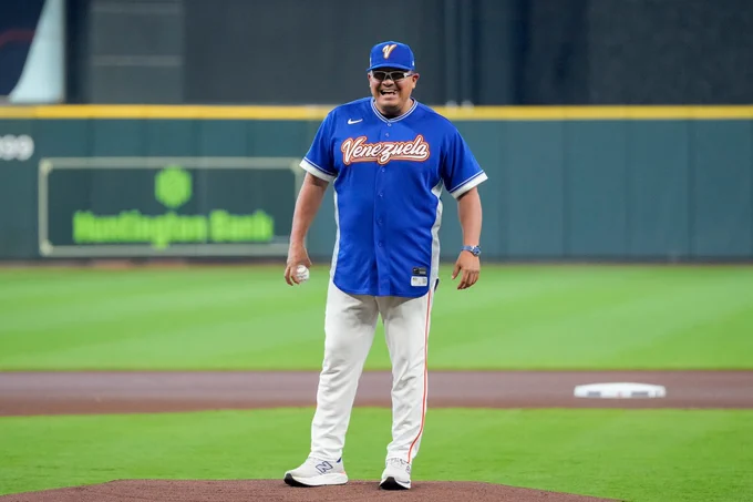 Omar López smiles on the mound at Daikin Park wearing a Team Venezuela uniform 