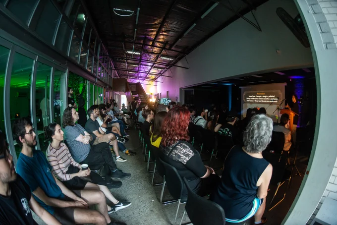 A photo of the crowd listening to Hari talk about Attack of the Astrals.