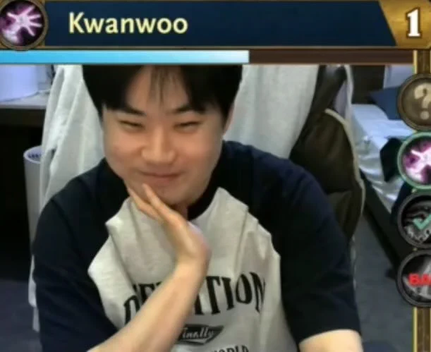 Kwanwoo looking smug in a Definition shirt