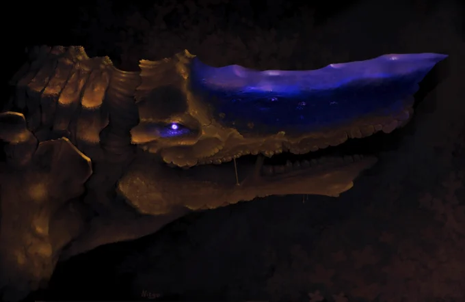 Digital drawing made on krita of a monster creature using a strict blue and gold palette.