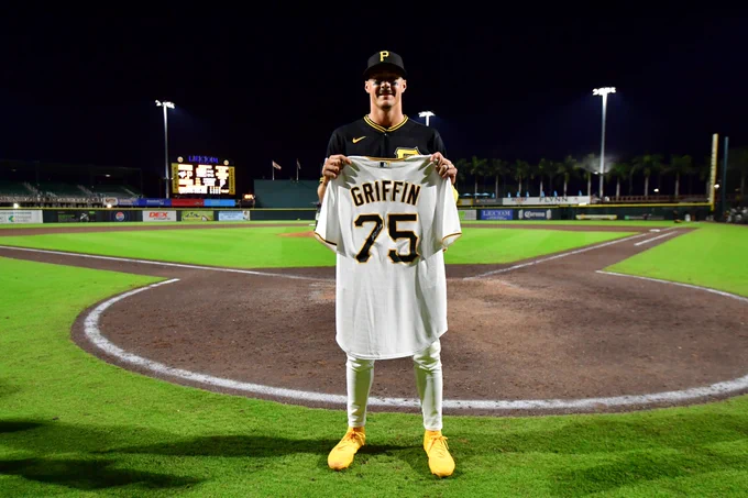 Photo of Konnor Griffin holding an autographed jersey