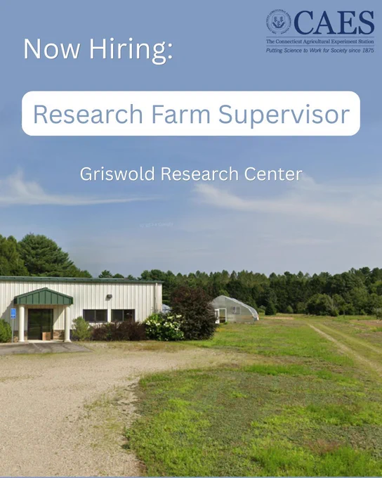 A job posting graphic with a light blue background featuring the CAES logo in the top right corner. Text reads 'Now Hiring: Research Farm Supervisor, Griswold Research Center.' The bottom half shows a photo of the Griswold Research Center, featuring a white metal building with a green roof, a greenhouse structure, open fields, and surrounding tree line.