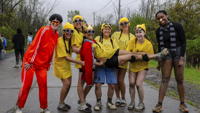 A group of people dressed up as Vector, Gru, and the minions.