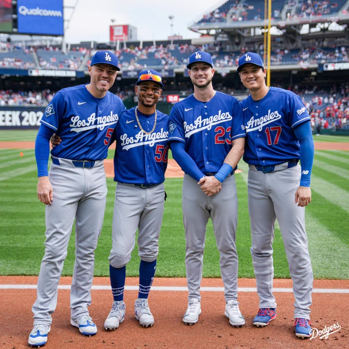 A photo of Freddie Freeman, Mookie Betts, Kyle Tucker and Shohei Ohtani on the field at Nationals Park in their new blue Dodger jerseys.
