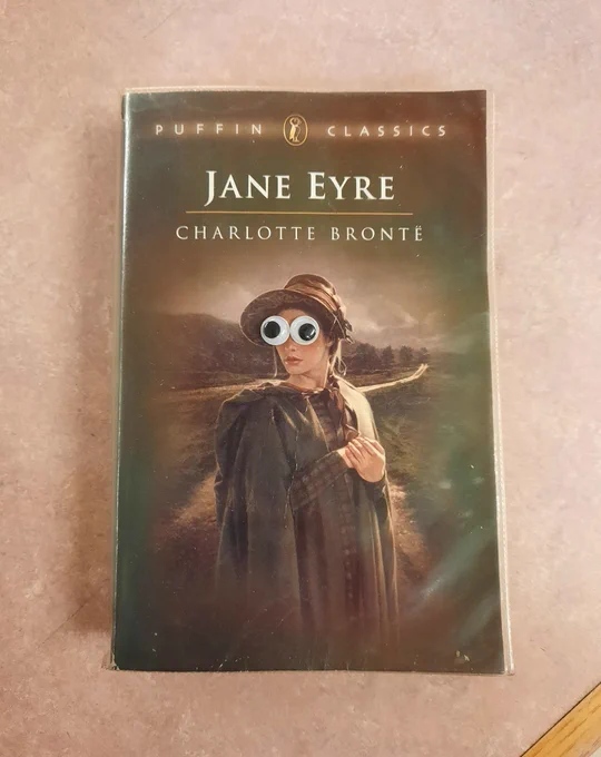 Jane Eyre by Charlotte Bronte. Googly eyes have been added to the cover artwork
