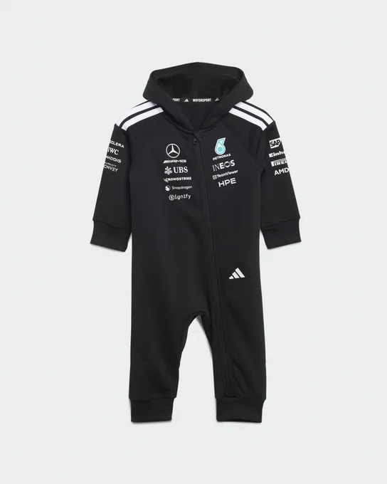 A babysuit branded like a Mercedes race suit laying flat to show the front of the suit clearly. 