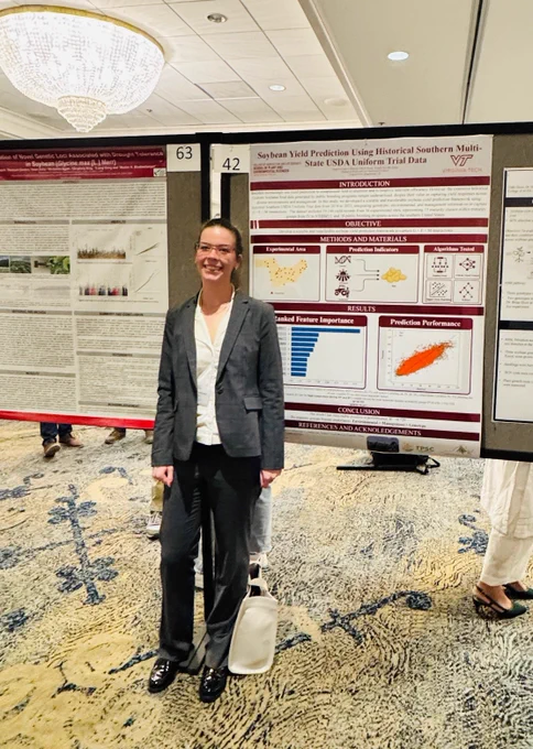 Virginia Claire Lehmann and her research poster, "Soybean Yield Prediction Using Historical Southern Multi-State USDA Uniform Trial Data".