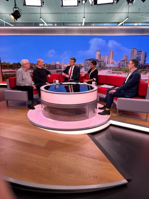 Five people on BBC Breakfast sofa.