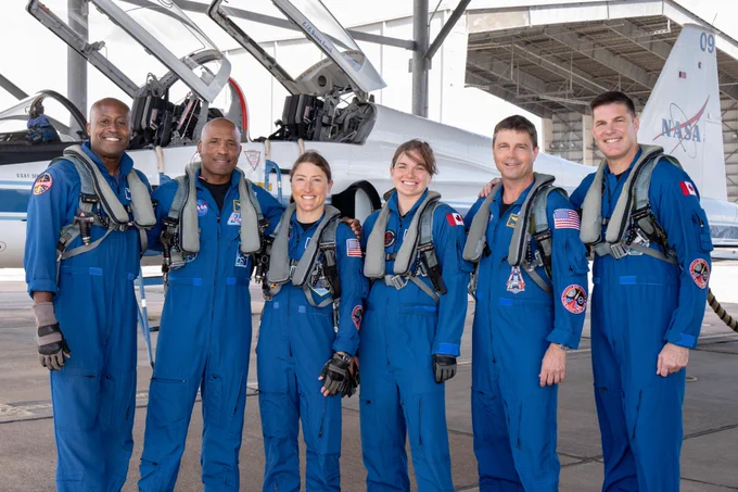 The Artemis II crew and their backups smile ahead of takeoff to NASA Kennedy on their T-38s. From left to right: NASA's Andre Douglas, Victor Glover, Christina Koch, CSA's Jenni Gibbons, NASA's Reid Wiseman, and CSA's Jeremy Hansen. Photo: Josh Valcarcel