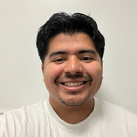 Headshot of Erik Gutierrez. 
