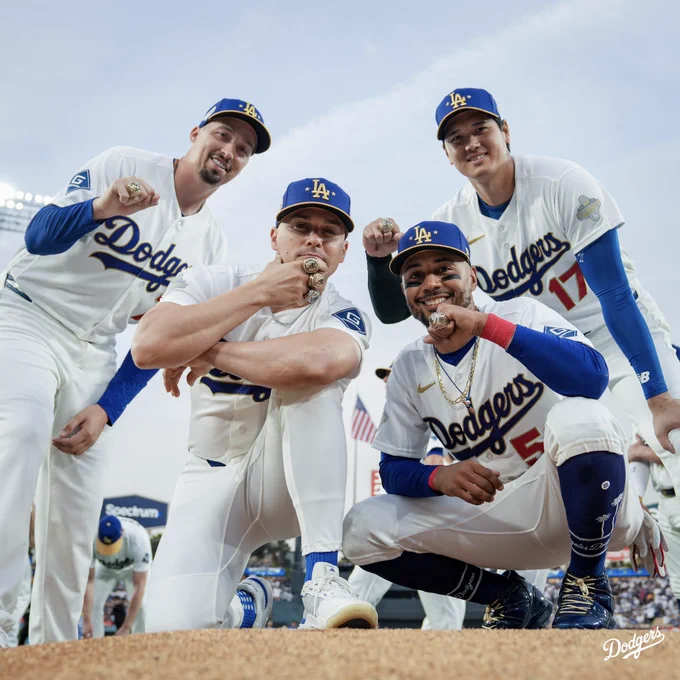 A group photo of Blake Snell, Kiké Hernández, Mookie Betts and Shohei Ohtani on the pitching mound with their World Series rings.