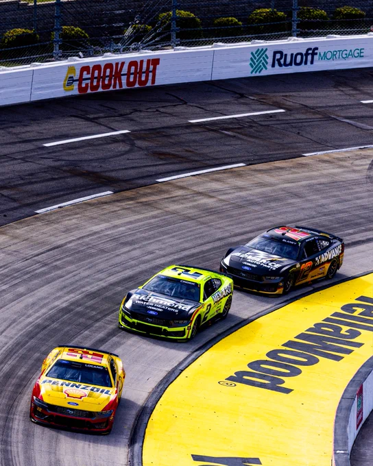 The Nos. 22, 2 and 12 race through the corner at Martinsville.