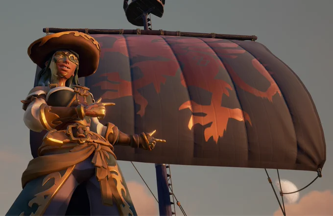 My pirate pointing to some beautiful sea of thieves sails, gifted from a generous friend to celebrate the anniversary event <3