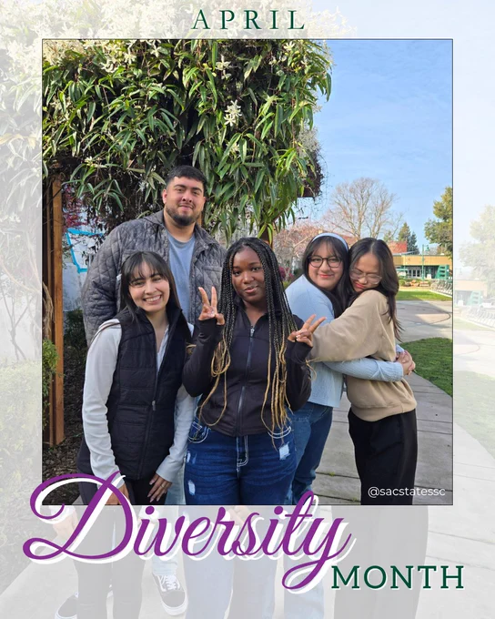 Five young adults pose together outdoors on a campus walkway, smiling and making peace signs, with greenery and a large flowering tree behind them. Two of them hug on the right side. Overlaid text reads “April” at the top and “Diversity Month” at the bottom.