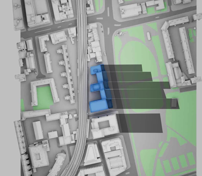 Aerial site model showing the proposed building (blue) next to the railway and the shadows it would cast across Bethnal Green Gardens.