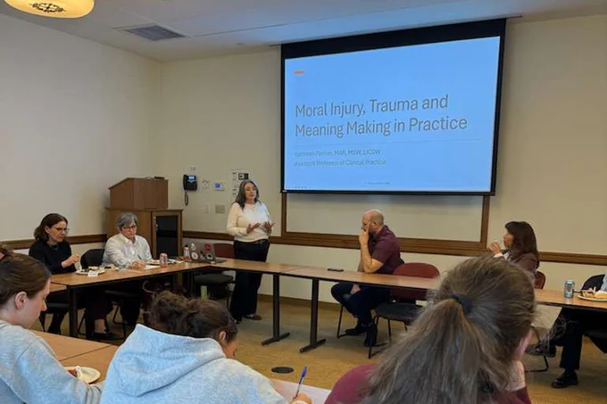 Kathleen Flinton delivers a presentation to students, faculty, and staff in Stokes Hall.