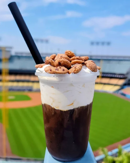 The Dodgers new Cookies & Cream Cold Brew with cold foam and cookie crisps topping. This coffee is pictured in front of Dodger Stadium.